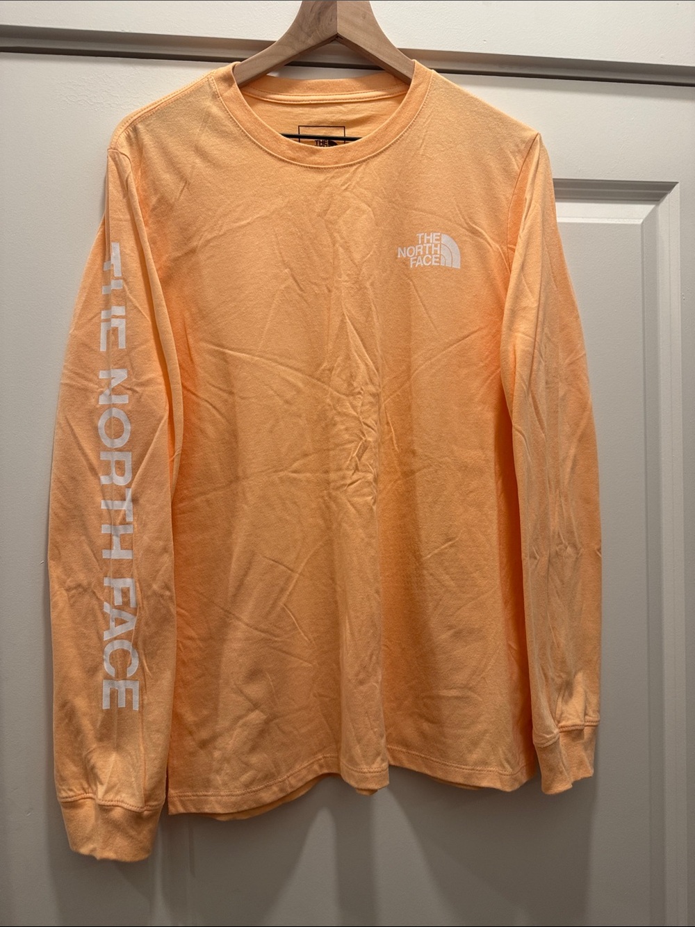 The North Face Long Sleeve Tee in Soft Peach with White Logos